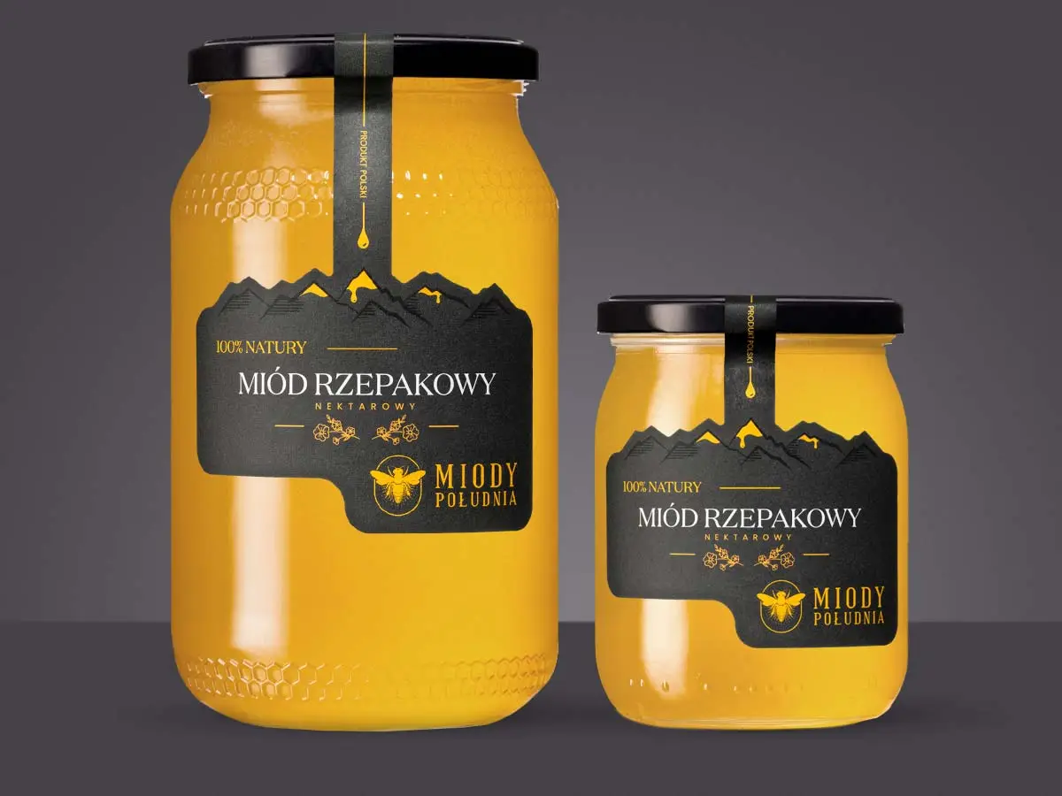 Dwa słoiki miodu rzepakowego płynnego